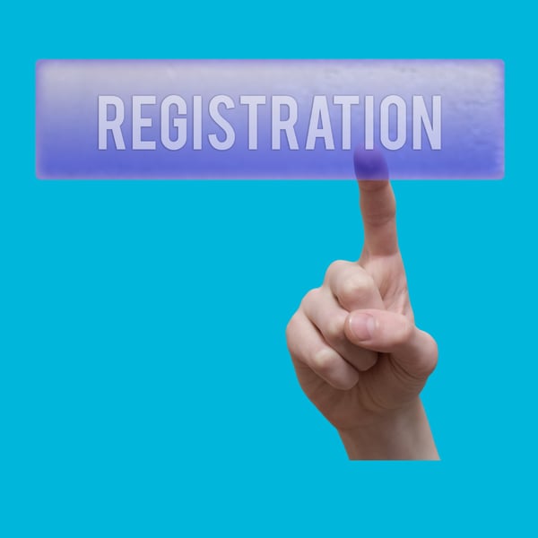 A hand with a finger outstretched pointing at the word 'registration' against a blue background