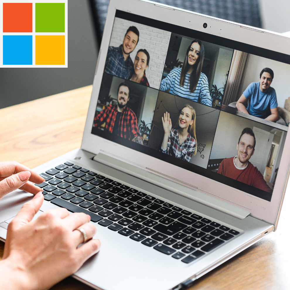 Photograph shows a laptop with the six person virtual meeting on screen. The Microsoft logo is displayed at the top left hand corner of the image.