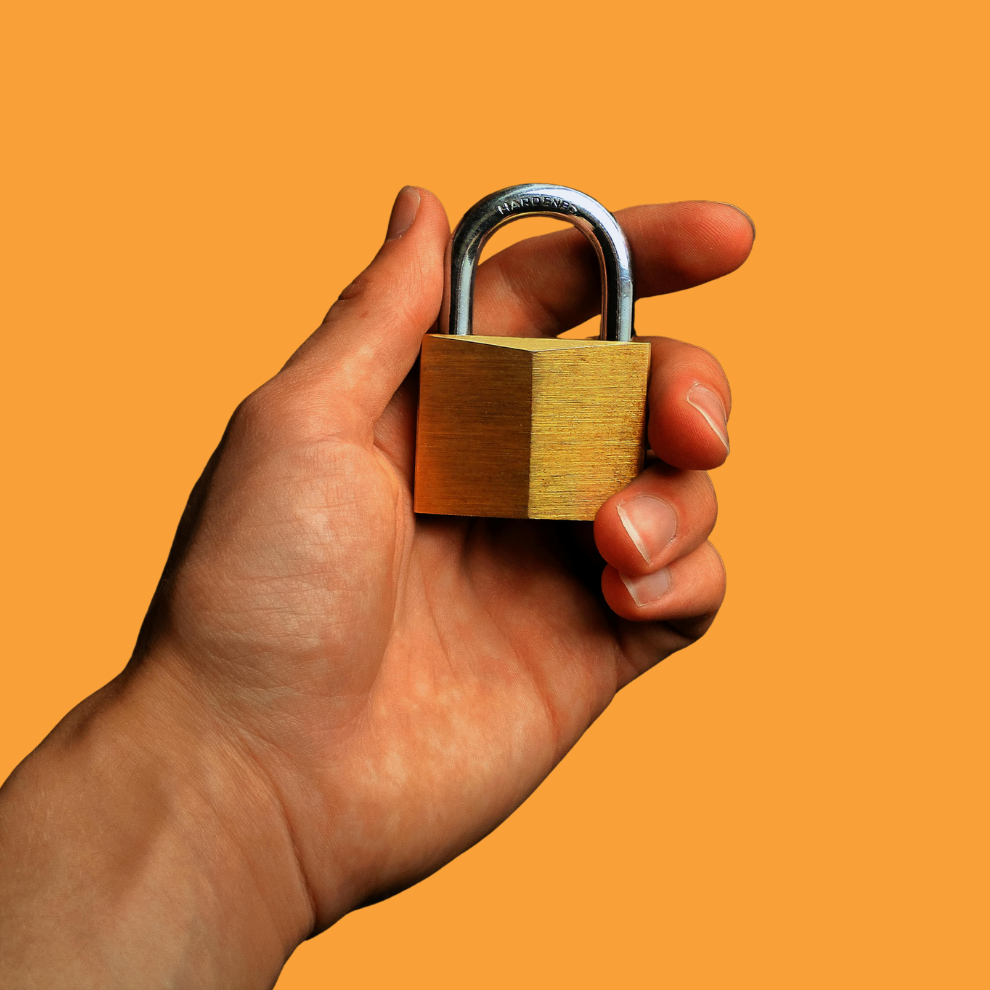A metallic image of a circuit board with a lock icon in the center