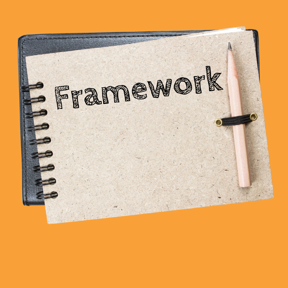 The front of a ring bound notebook with the word 'Framework' in large letters on the front, against an orange background