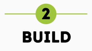 A round green circle with the figure 2 inside it in black font. The word Build below in large black capital letters
