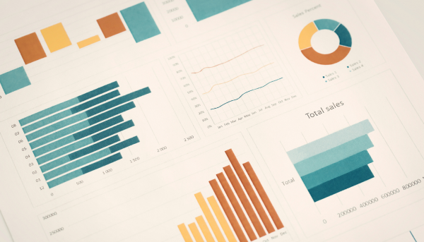 a number of blue, green and orange charts and graphs on a white page